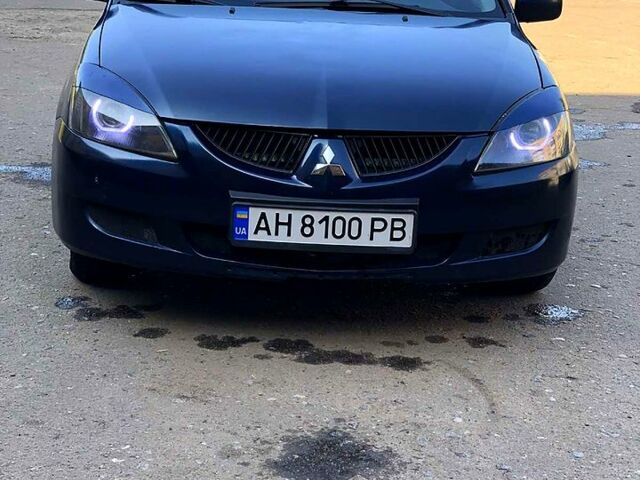 Синій Міцубісі Lancer, об'ємом двигуна 1.6 л та пробігом 248 тис. км за 4200 $, фото 1 на Automoto.ua