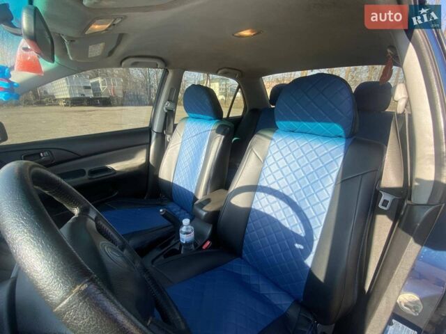 Синій Міцубісі Lancer, об'ємом двигуна 1.58 л та пробігом 287 тис. км за 4000 $, фото 1 на Automoto.ua