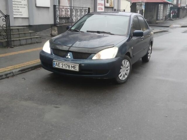 Синий Мицубиси Лансер, объемом двигателя 1.6 л и пробегом 358 тыс. км за 3300 $, фото 1 на Automoto.ua