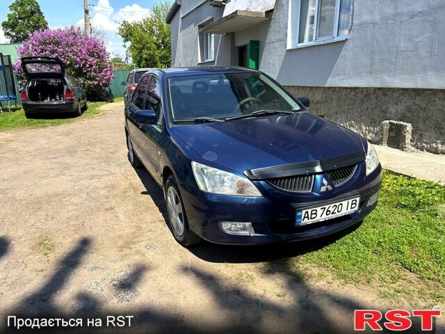Синій Міцубісі Lancer, об'ємом двигуна 1.6 л та пробігом 282 тис. км за 3500 $, фото 1 на Automoto.ua