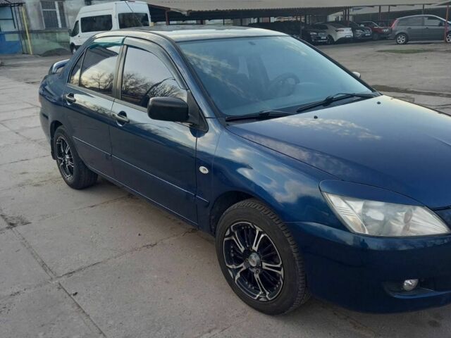 Синий Мицубиси Лансер, объемом двигателя 0 л и пробегом 111 тыс. км за 3900 $, фото 1 на Automoto.ua