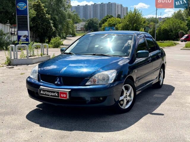Синій Міцубісі Lancer, об'ємом двигуна 1.6 л та пробігом 159 тис. км за 4340 $, фото 1 на Automoto.ua