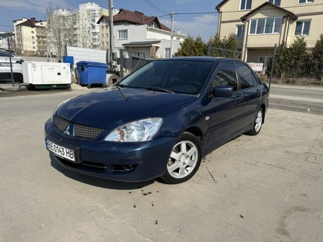 Синий Мицубиси Лансер, объемом двигателя 1.6 л и пробегом 275 тыс. км за 2650 $, фото 1 на Automoto.ua
