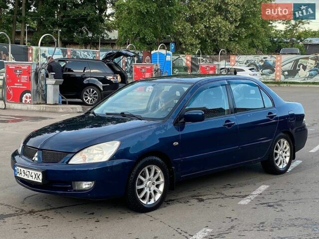 Синій Міцубісі Lancer, об'ємом двигуна 1.6 л та пробігом 400 тис. км за 2500 $, фото 1 на Automoto.ua