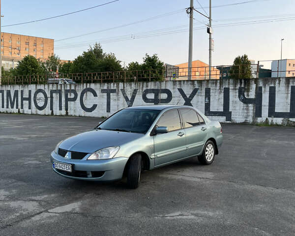 Синій Міцубісі Lancer, об'ємом двигуна 1.6 л та пробігом 237 тис. км за 4099 $, фото 1 на Automoto.ua