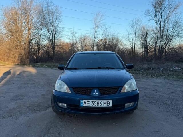 Синий Мицубиси Лансер, объемом двигателя 1.6 л и пробегом 330 тыс. км за 3999 $, фото 1 на Automoto.ua