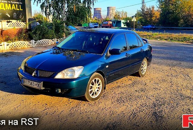 Синий Мицубиси Лансер, объемом двигателя 1.6 л и пробегом 320 тыс. км за 3800 $, фото 1 на Automoto.ua