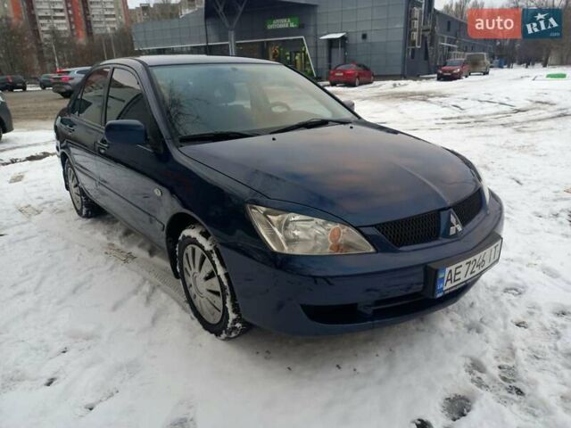Синий Мицубиси Лансер, объемом двигателя 1.6 л и пробегом 284 тыс. км за 4800 $, фото 1 на Automoto.ua