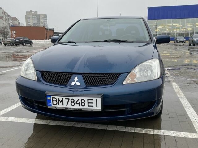 Синий Мицубиси Лансер, объемом двигателя 1.6 л и пробегом 180 тыс. км за 3700 $, фото 1 на Automoto.ua