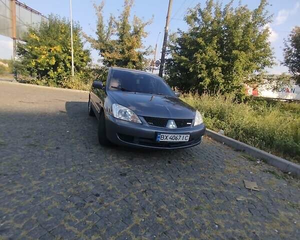 Синій Міцубісі Lancer, об'ємом двигуна 1.6 л та пробігом 290 тис. км за 4100 $, фото 1 на Automoto.ua