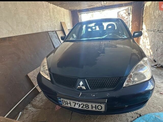 Синій Міцубісі Lancer, об'ємом двигуна 1.6 л та пробігом 99 тис. км за 5377 $, фото 1 на Automoto.ua