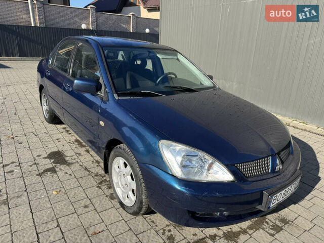 Синій Міцубісі Lancer, об'ємом двигуна 1.6 л та пробігом 148 тис. км за 3000 $, фото 1 на Automoto.ua