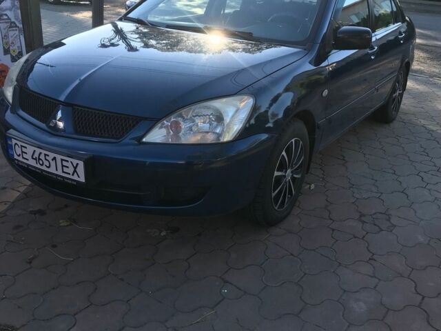 Синій Міцубісі Lancer, об'ємом двигуна 1.3 л та пробігом 265 тис. км за 2550 $, фото 1 на Automoto.ua