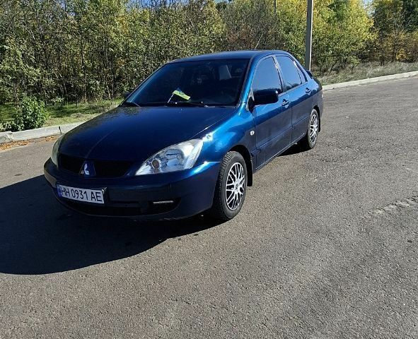 Синій Міцубісі Lancer, об'ємом двигуна 1.6 л та пробігом 267 тис. км за 3700 $, фото 1 на Automoto.ua