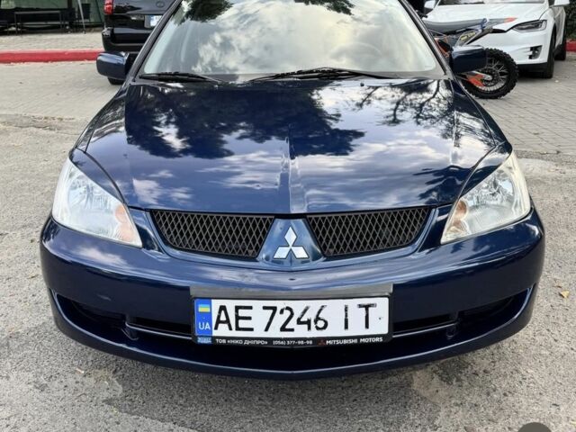 Синий Мицубиси Лансер, объемом двигателя 1.6 л и пробегом 285 тыс. км за 4650 $, фото 1 на Automoto.ua