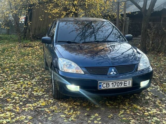 Синій Міцубісі Lancer, об'ємом двигуна 1.6 л та пробігом 380 тис. км за 3600 $, фото 1 на Automoto.ua