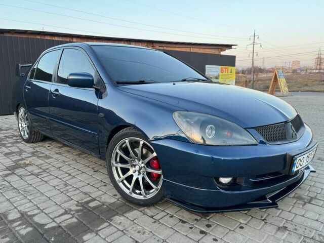 Синій Міцубісі Lancer, об'ємом двигуна 1.6 л та пробігом 226 тис. км за 4705 $, фото 1 на Automoto.ua