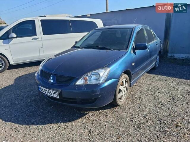 Синий Мицубиси Лансер, объемом двигателя 1.58 л и пробегом 274 тыс. км за 2650 $, фото 1 на Automoto.ua