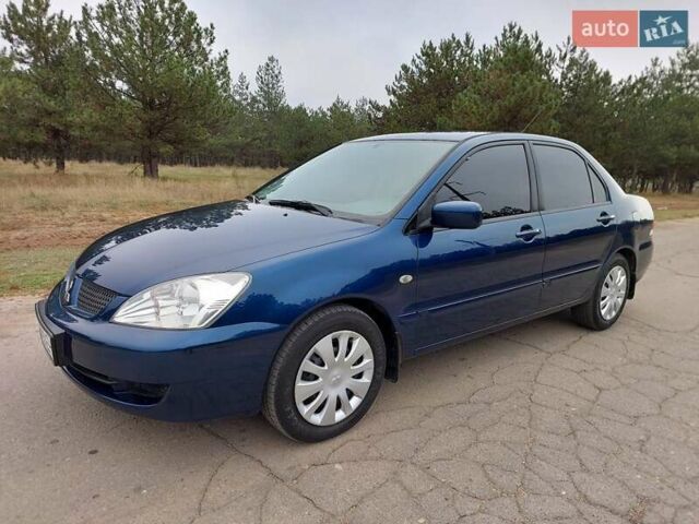 Синий Мицубиси Лансер, объемом двигателя 1.6 л и пробегом 222 тыс. км за 4599 $, фото 1 на Automoto.ua