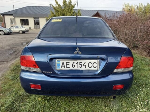 Синій Міцубісі Lancer, об'ємом двигуна 1.6 л та пробігом 220 тис. км за 3700 $, фото 1 на Automoto.ua