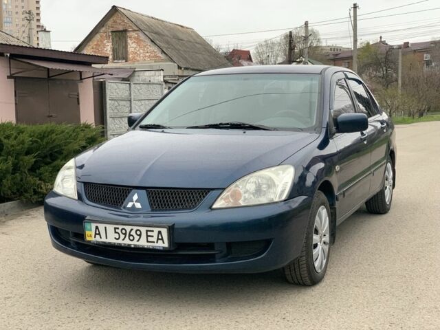 Синий Мицубиси Лансер, объемом двигателя 1.6 л и пробегом 179 тыс. км за 3999 $, фото 1 на Automoto.ua