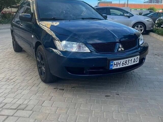 Синій Міцубісі Lancer, об'ємом двигуна 1.6 л та пробігом 214 тис. км за 3800 $, фото 1 на Automoto.ua