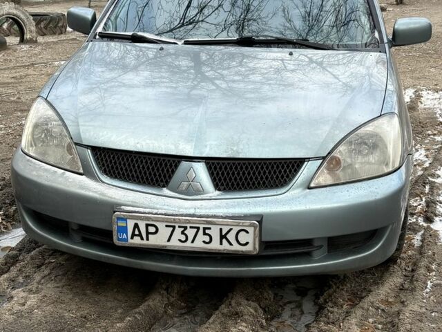 Синий Мицубиси Лансер, объемом двигателя 1.6 л и пробегом 275 тыс. км за 3700 $, фото 1 на Automoto.ua