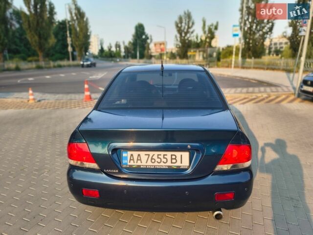 Синій Міцубісі Lancer, об'ємом двигуна 1.6 л та пробігом 280 тис. км за 4000 $, фото 1 на Automoto.ua