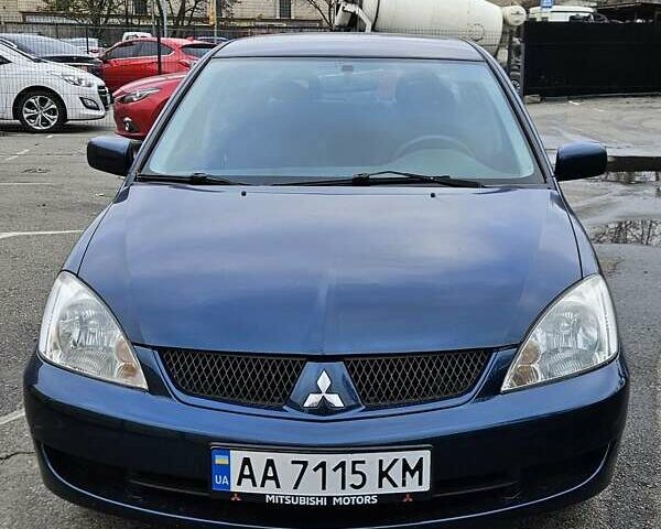 Синий Мицубиси Лансер, объемом двигателя 1.62 л и пробегом 114 тыс. км за 5200 $, фото 1 на Automoto.ua