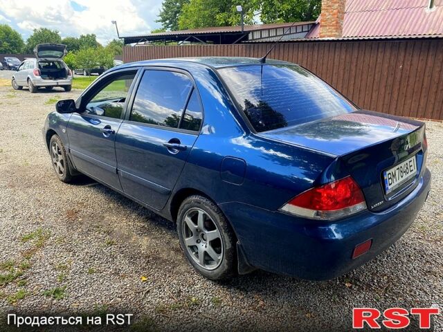 Синій Міцубісі Lancer, об'ємом двигуна 1.6 л та пробігом 225 тис. км за 3000 $, фото 1 на Automoto.ua