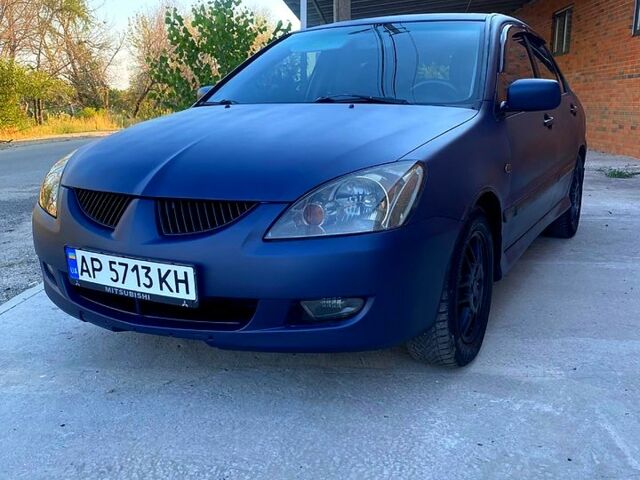 Синій Міцубісі Lancer, об'ємом двигуна 2 л та пробігом 0 тис. км за 4799 $, фото 1 на Automoto.ua