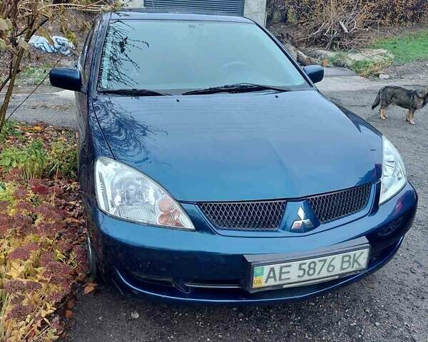Синий Мицубиси Лансер, объемом двигателя 1.6 л и пробегом 87 тыс. км за 6800 $, фото 1 на Automoto.ua