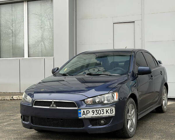 Синий Мицубиси Лансер, объемом двигателя 2 л и пробегом 255 тыс. км за 5350 $, фото 1 на Automoto.ua