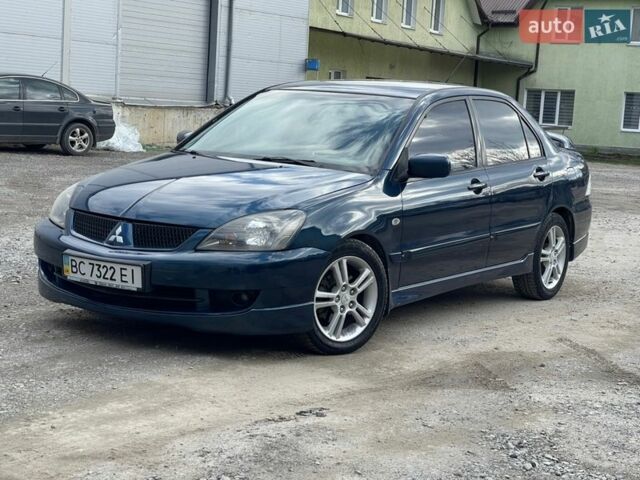 Синій Міцубісі Lancer, об'ємом двигуна 2 л та пробігом 217 тис. км за 4100 $, фото 1 на Automoto.ua