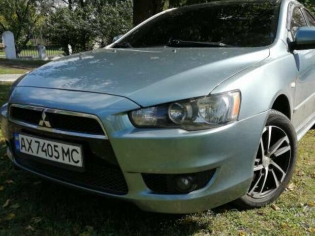 Синій Міцубісі Lancer, об'ємом двигуна 2 л та пробігом 285 тис. км за 5500 $, фото 1 на Automoto.ua