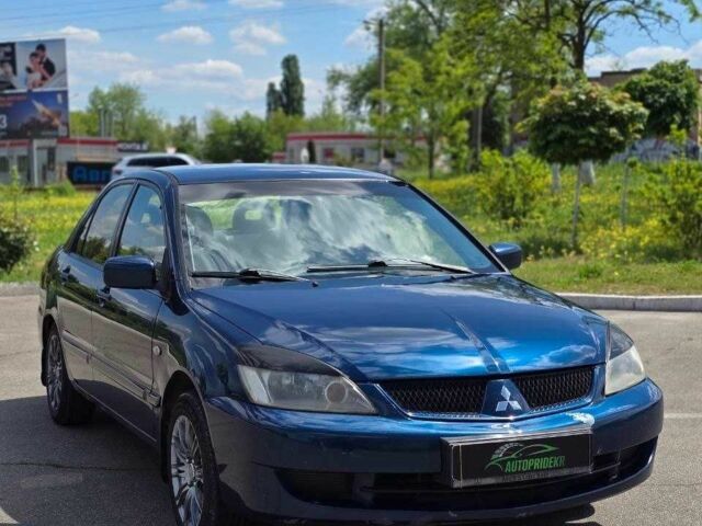Синий Мицубиси Лансер, объемом двигателя 1.6 л и пробегом 339 тыс. км за 3250 $, фото 1 на Automoto.ua