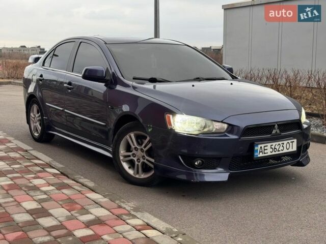Синий Мицубиси Лансер, объемом двигателя 2 л и пробегом 353 тыс. км за 6999 $, фото 1 на Automoto.ua