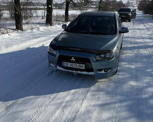 Синий Мицубиси Лансер, объемом двигателя 2 л и пробегом 168 тыс. км за 6600 $, фото 1 на Automoto.ua