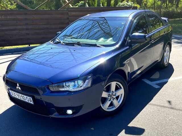 Синій Міцубісі Lancer, об'ємом двигуна 2 л та пробігом 300 тис. км за 5850 $, фото 1 на Automoto.ua