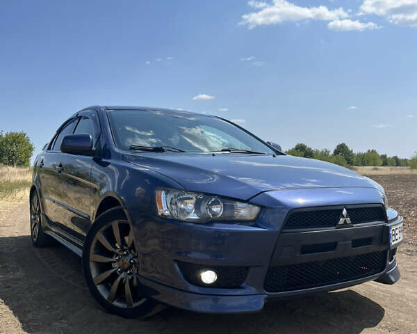 Синій Міцубісі Lancer, об'ємом двигуна 2 л та пробігом 185 тис. км за 7700 $, фото 1 на Automoto.ua