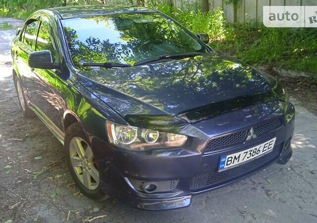 Синій Міцубісі Lancer, об'ємом двигуна 2 л та пробігом 173 тис. км за 6500 $, фото 1 на Automoto.ua