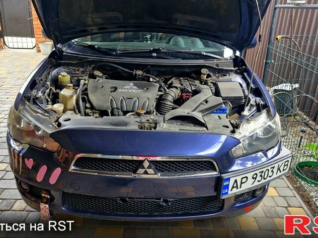 Синій Міцубісі Lancer, об'ємом двигуна 2 л та пробігом 248 тис. км за 5000 $, фото 1 на Automoto.ua
