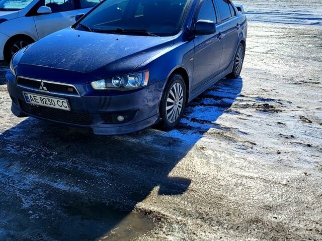 Синий Мицубиси Лансер, объемом двигателя 2 л и пробегом 21500 тыс. км за 7000 $, фото 1 на Automoto.ua