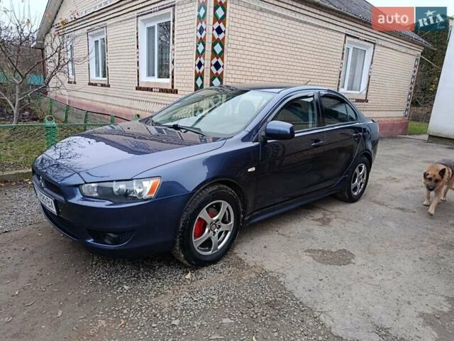 Синий Мицубиси Лансер, объемом двигателя 1.5 л и пробегом 211 тыс. км за 5222 $, фото 1 на Automoto.ua