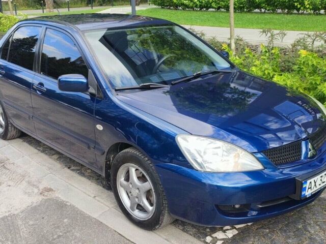 Синій Міцубісі Lancer, об'ємом двигуна 1.6 л та пробігом 198 тис. км за 4800 $, фото 1 на Automoto.ua