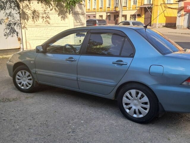 Синій Міцубісі Lancer, об'ємом двигуна 1.6 л та пробігом 275 тис. км за 4200 $, фото 1 на Automoto.ua
