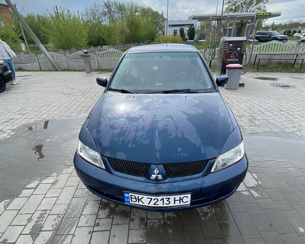 Синій Міцубісі Lancer, об'ємом двигуна 1.6 л та пробігом 245 тис. км за 3500 $, фото 1 на Automoto.ua