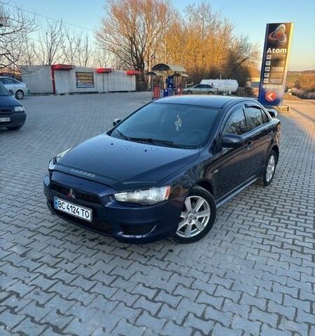 Синий Мицубиси Лансер, объемом двигателя 2 л и пробегом 330 тыс. км за 4850 $, фото 1 на Automoto.ua