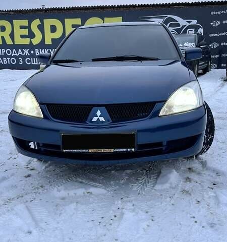 Синій Міцубісі Lancer, об'ємом двигуна 1.58 л та пробігом 233 тис. км за 4150 $, фото 1 на Automoto.ua