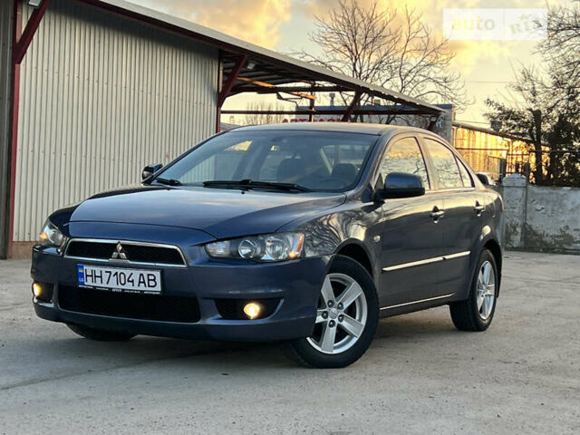 Синій Міцубісі Lancer, об'ємом двигуна 2 л та пробігом 204 тис. км за 6600 $, фото 1 на Automoto.ua